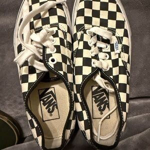 Vans Black and White Checkered Slip-Ons